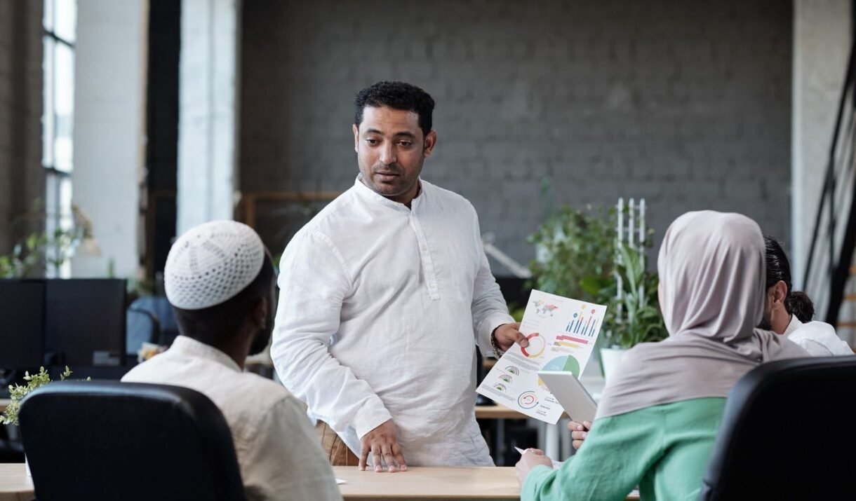 confident businessman with financial paper looking zwvq27j