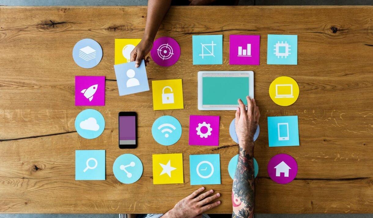 group of computer icon on the wooden table p77yusb